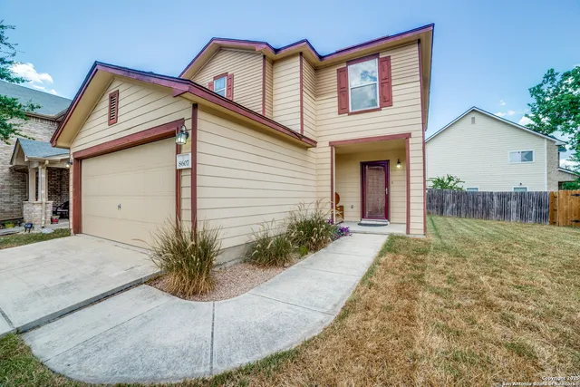 a view of a house with a patio