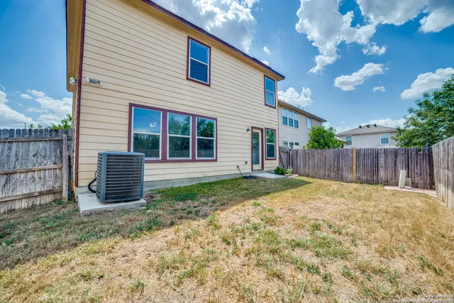 a view of backyard of house