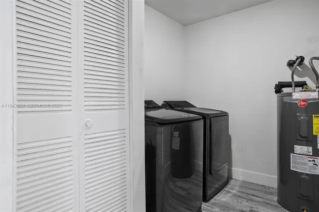 an empty room with wooden floor