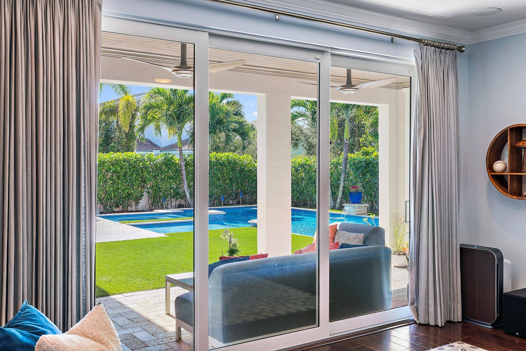 2835 East Mallory Boulevard Jupiter, FL 33458 - Photo 14 of 51 a view of swimming pool from a room