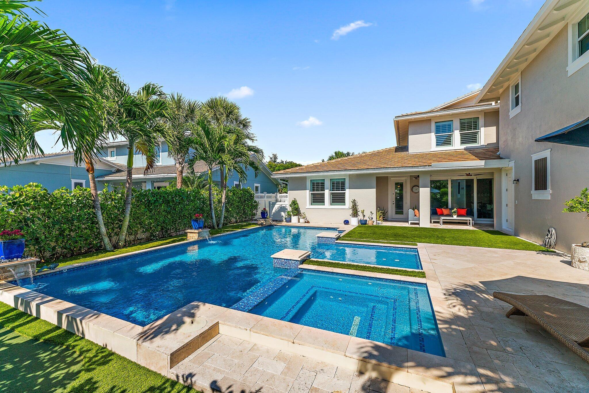 2835 East Mallory Boulevard Jupiter, FL 33458 - Photo 38 of 51 a house view with swimming pool and sitting space