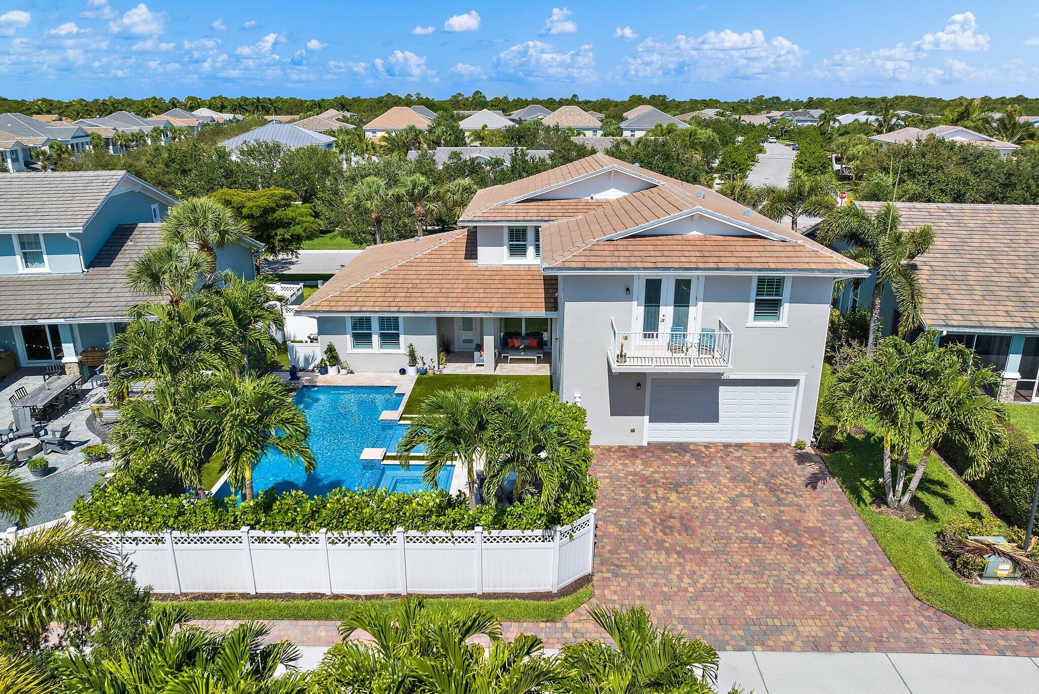 2835 East Mallory Boulevard Jupiter, FL 33458 - Photo 49 of 51 an aerial view of a house