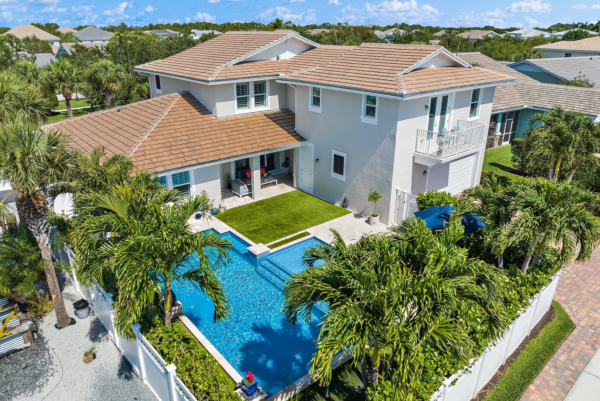 2835 East Mallory Boulevard Jupiter, FL 33458 - Photo 50 of 51 an aerial view of a house with yard