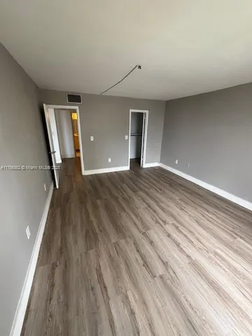 a view of swimming pool from a balcony
