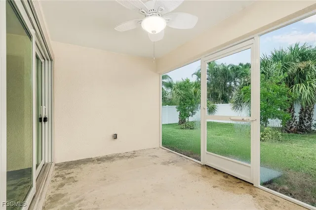 a kitchen with stainless steel appliances granite countertop a refrigerator a stove a sink a microwave a refrigerator and a counter space