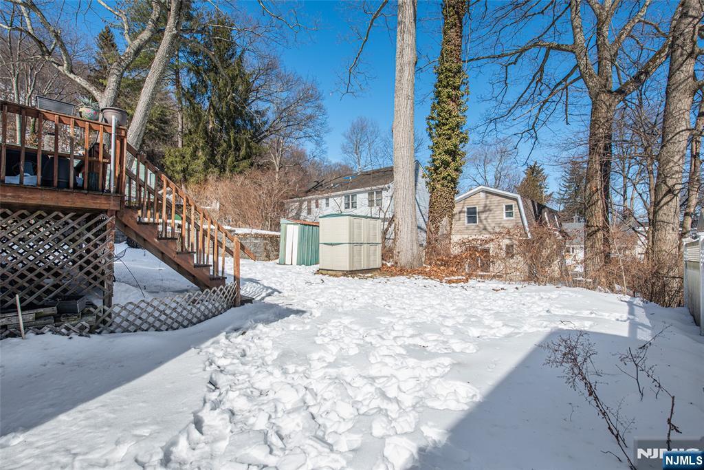 8 South Shore Road Denville, NJ 07834 - Photo 15 of 18 a view of a backyard with a trees