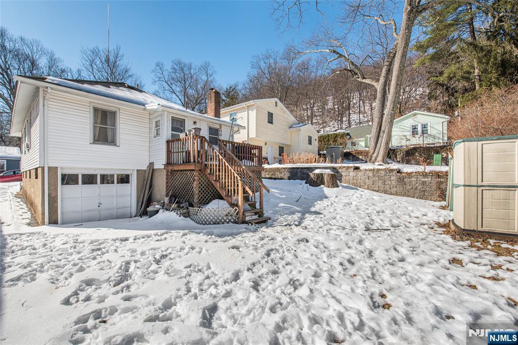 8 South Shore Road Denville, NJ 07834 - Photo 16 of 18 a view of a backyard with a large tree