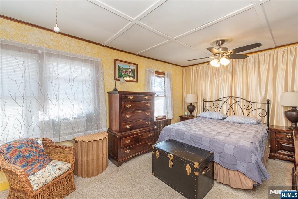 8 South Shore Road Denville, NJ 07834 - Photo 10 of 18 a bedroom with a bed and a dresser