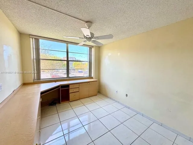 a room with a window and a table