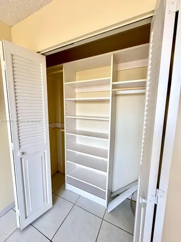 a view of front door with hallway