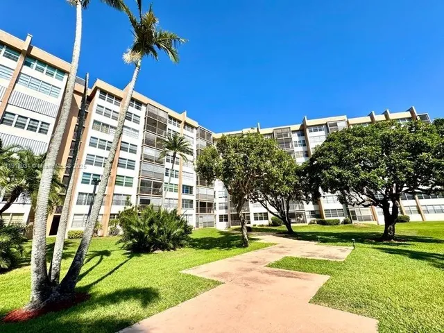 a view of a building with a street