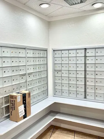 a view of a house with a backyard and porch