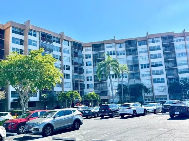 a cars parked in front of a building