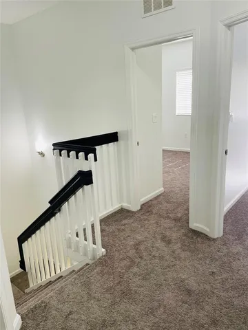 a view of entryway with stairs