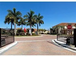 a view of a wrought iron fence
