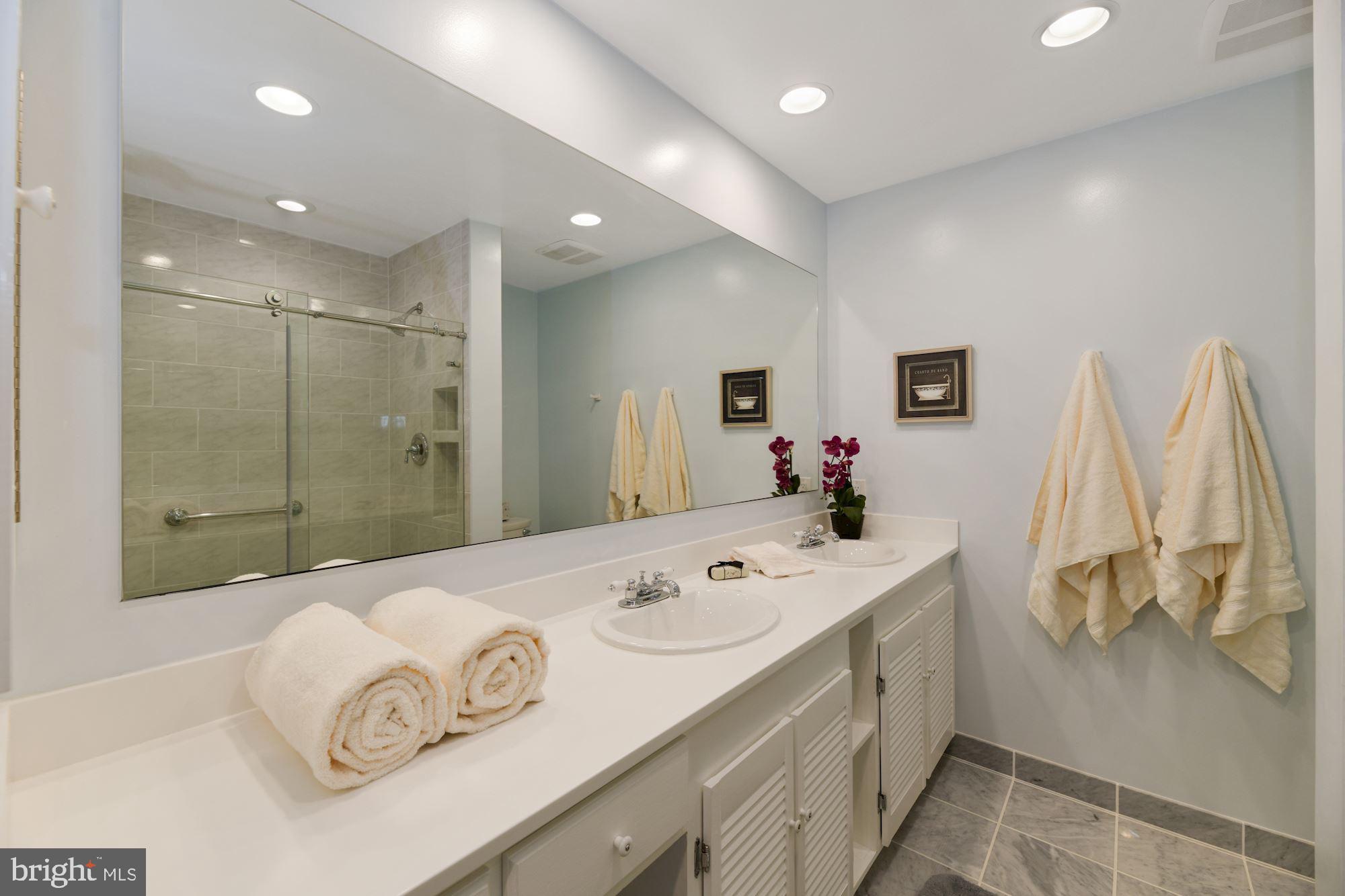 8427 Forrester Boulevard Springfield, VA 22152 - Photo 20 of 49 Remodeled master bath w/ quartz top & marble floor