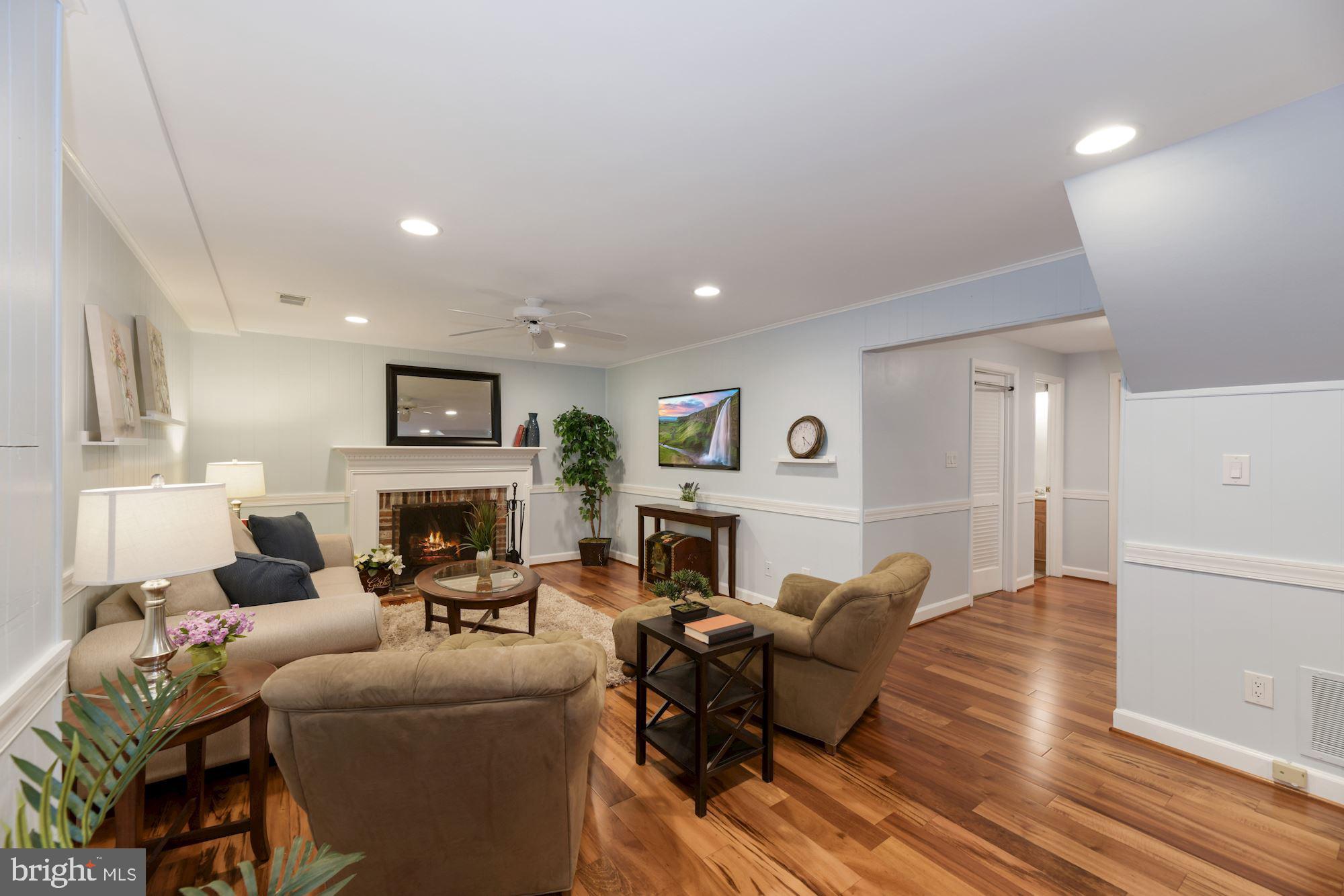 8427 Forrester Boulevard Springfield, VA 22152 - Photo 30 of 49 Huge lower level living space w/ wood-burning FP