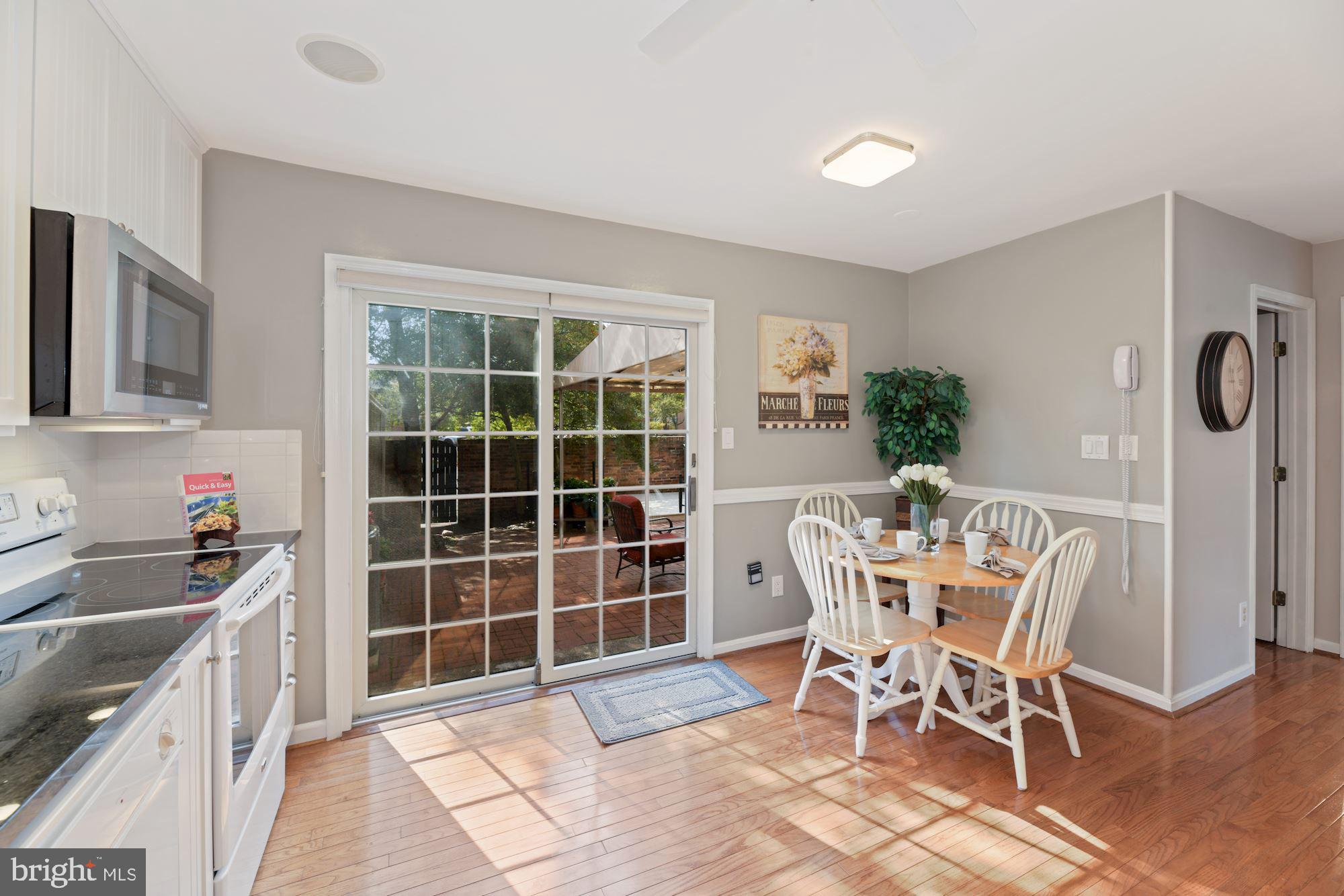 8427 Forrester Boulevard Springfield, VA 22152 - Photo 5 of 49 Walk out to private patio backyard space