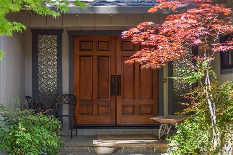 2454 Vineyard Road Novato, CA 94947 - Photo 1 of 1 a view of a house with a potted plant and a large tree