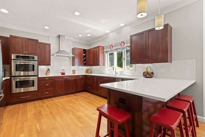 51 Fox Run Road Sudbury, MA 01776 - Photo 11 of 37 a kitchen with a sink cabinets and stainless steel appliances