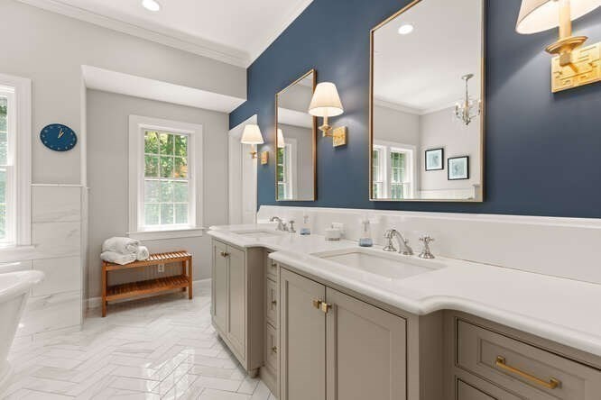 51 Fox Run Road Sudbury, MA 01776 - Photo 20 of 37 a spacious bathroom with a double vanity sink and a mirror