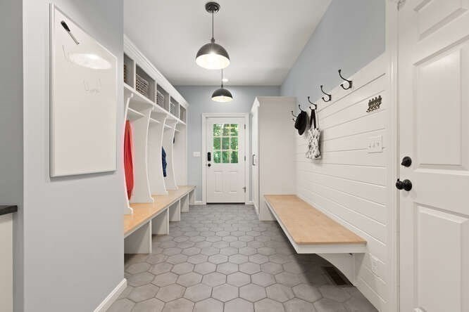 51 Fox Run Road Sudbury, MA 01776 - Photo 27 of 37 a view of entryway with stairs and a chandelier