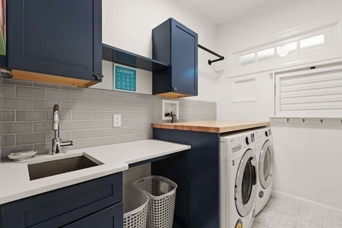 51 Fox Run Road Sudbury, MA 01776 - Photo 29 of 37 a utility room with sink dryer and washer