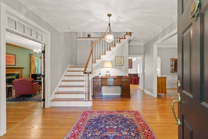 51 Fox Run Road Sudbury, MA 01776 - Photo 3 of 37 a view of entryway and hall with wooden floor
