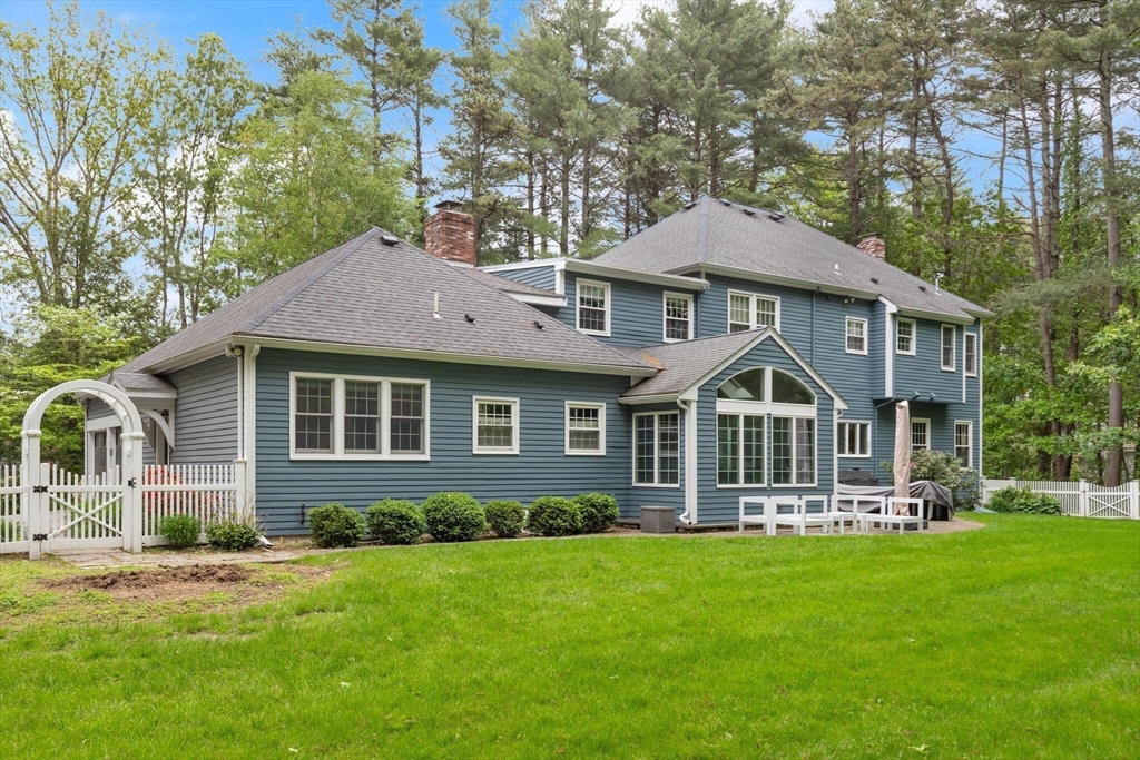 51 Fox Run Road Sudbury, MA 01776 - Photo 34 of 37 a front view of a house with a yard
