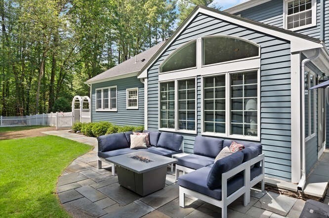 51 Fox Run Road Sudbury, MA 01776 - Photo 35 of 37 a view of a house with a backyard and a patio