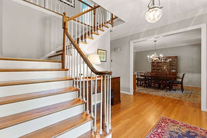 51 Fox Run Road Sudbury, MA 01776 - Photo 4 of 37 a view of entryway livingroom and hall with wooden floor