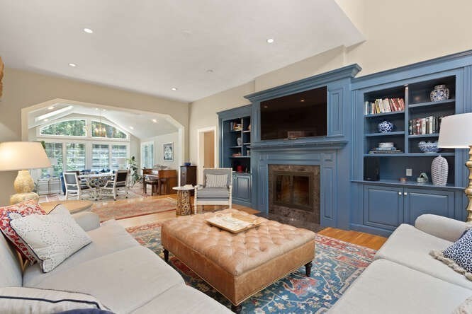 51 Fox Run Road Sudbury, MA 01776 - Photo 8 of 37 a living room with furniture fireplace and a flat screen tv