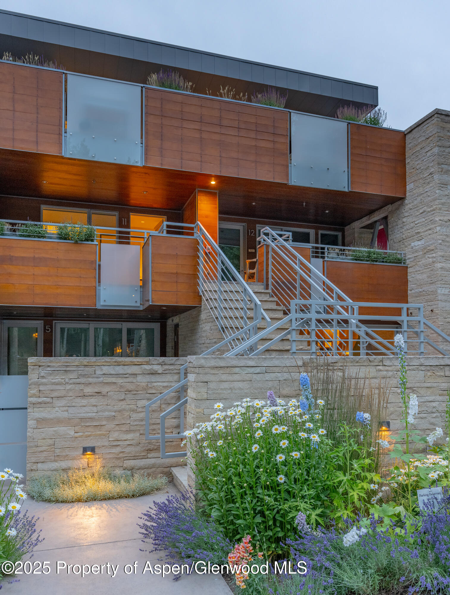 100 East Cooper Avenue, Unit 11 Aspen, CO 81611 - Photo 43 of 44 a view of a house with a balcony
