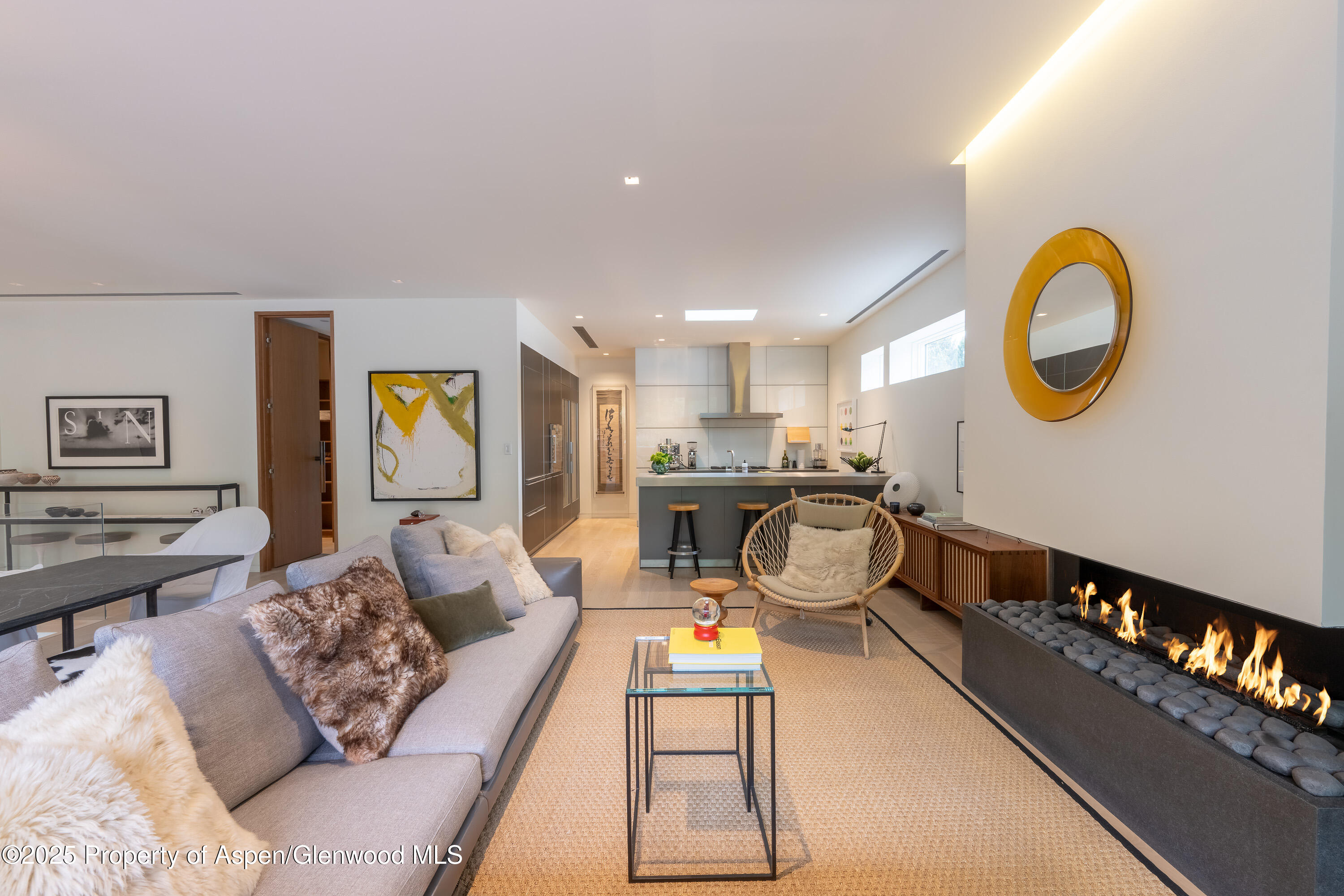 100 East Cooper Avenue, Unit 11 Aspen, CO 81611 - Photo 7 of 44 a living room with furniture and a window
