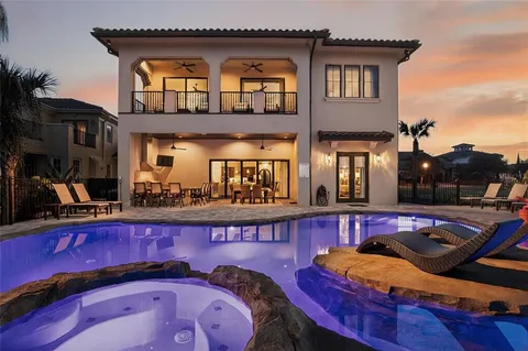 a view of a white and a big yard