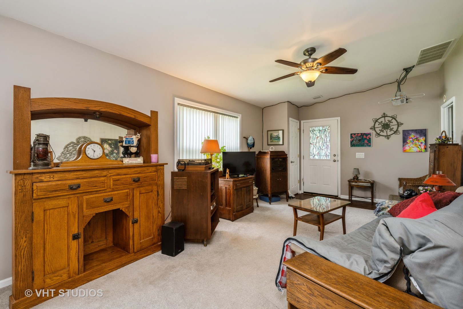 1016 Castleton Court Grayslake, IL 60030 - Photo 3 of 13 a living room with furniture and a fireplace