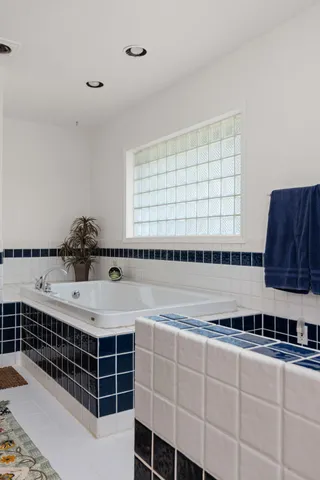 a view of a patio with a table chairs and balcony