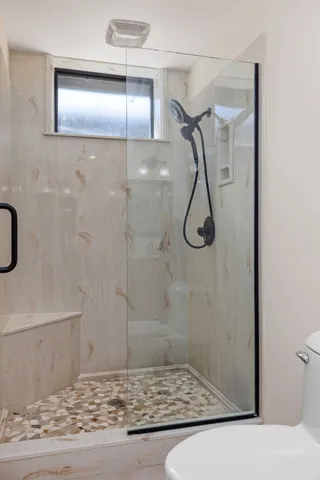 a view of a room with rack and wooden floor