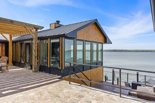 a view of living room with furniture and wooden floor