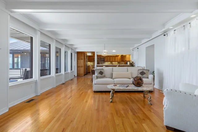 a view of a dinning tables and chairs in patio of the house