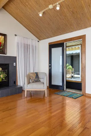 an aerial view of a chairs with chandelier