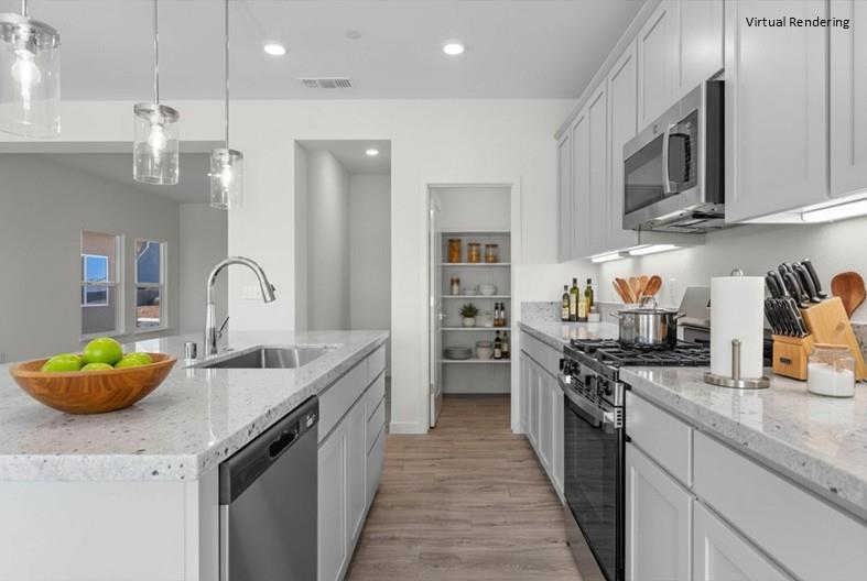 271 Piper Lane Colusa, CA 95932 - Photo 20 of 39 a kitchen with stainless steel appliances granite countertop a sink stove and refrigerator