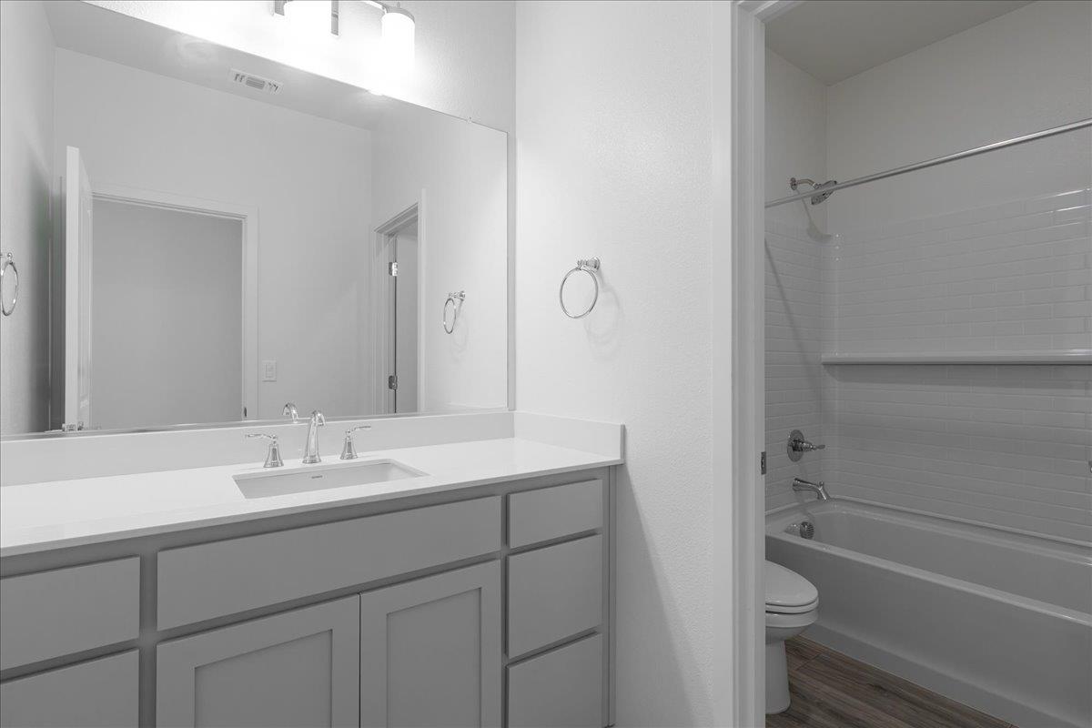 271 Piper Lane Colusa, CA 95932 - Photo 28 of 39 a bathroom with a sink toilet vanity and tub