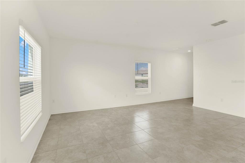 517 Bell Prairie Circle Lake Wales, FL 33859 - Photo 11 of 42 an empty room with windows
