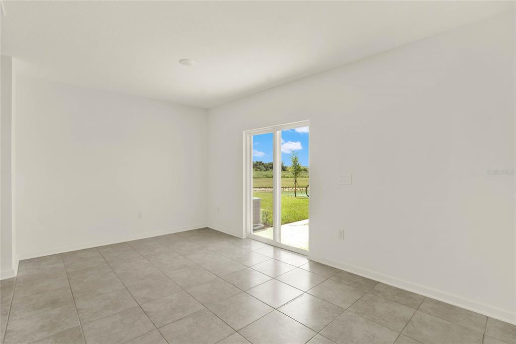517 Bell Prairie Circle Lake Wales, FL 33859 - Photo 12 of 42 a view of an empty room with a window