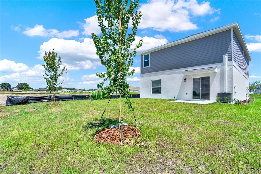 517 Bell Prairie Circle Lake Wales, FL 33859 - Photo 13 of 42 a view of a house with a yard