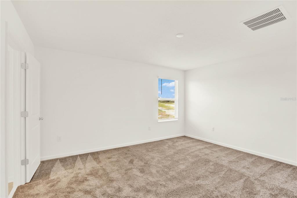 517 Bell Prairie Circle Lake Wales, FL 33859 - Photo 20 of 42 a view of an empty room and a window