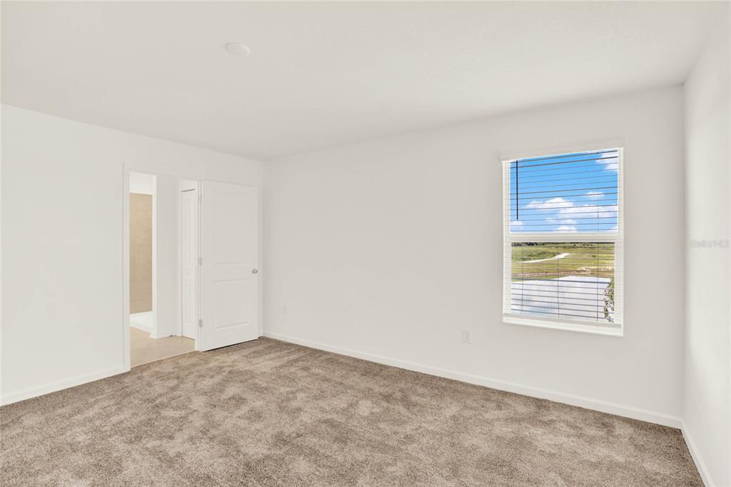 517 Bell Prairie Circle Lake Wales, FL 33859 - Photo 22 of 42 a view of an empty room and a window