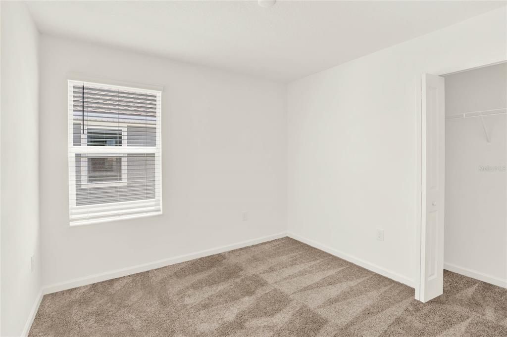 517 Bell Prairie Circle Lake Wales, FL 33859 - Photo 27 of 42 a view of an empty room with a window