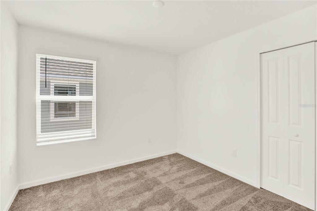 517 Bell Prairie Circle Lake Wales, FL 33859 - Photo 31 of 42 a view of an empty room with a window